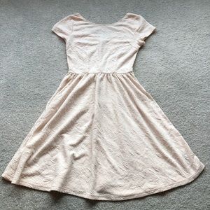 Lace pattern white dress.